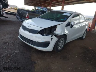 2016 Kia Rio LX with VIN KNADM4A38G6564814, listed as a IAAI auction lot 41789215 with 122,872 mi miles. Bid and sale history available at carsss.com. Image 2.