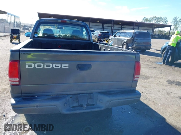 2001 Dodge Dakota with VIN 1B7FL26X91S342103, listed as a IAAI auction lot 41277465 with 157,993 mi miles. Bid and sale history available at carsss.com. Image 16.