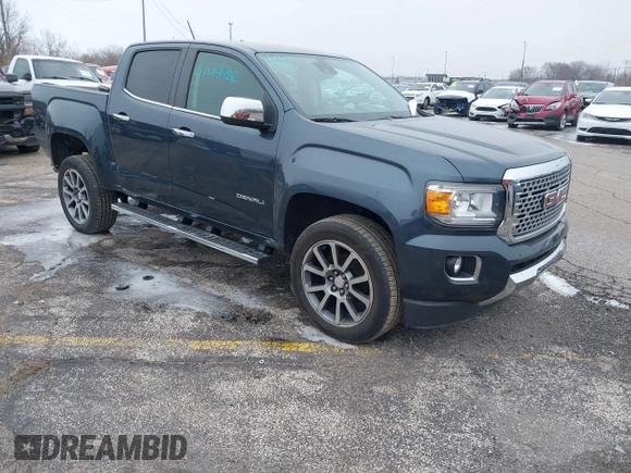 2019 GMC Canyon 4WD Denali with VIN 1GTG6EENXK1321734, listed as a IAAI auction lot 41491402 with 60,026 mi miles. Bid and sale history available at carsss.com. Image 1.