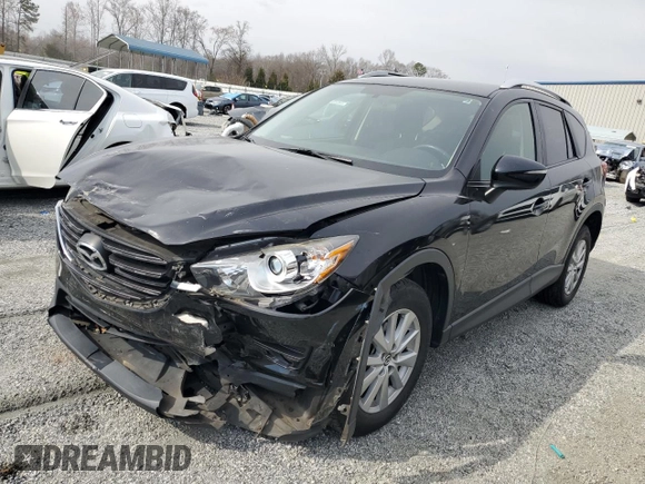 2016 Mazda CX-5 Touring with VIN JM3KE2CY1G0654434, listed as a Copart auction lot 48974115 with 83,977 mi miles and Salvage Title. Bid and sale history available at carsss.com. Image 1.