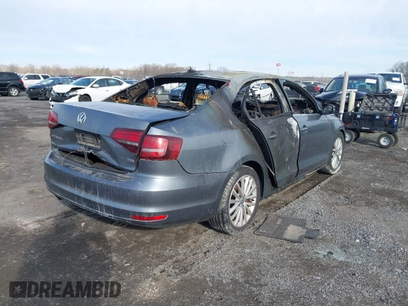 2016 Volkswagen Jetta Sedan 1.8T SEL with VIN 3VWL17AJ8GM365184, listed as a IAAI auction lot 41652449 with 120,721 mi miles. Bid and sale history available at carsss.com. Image 4.