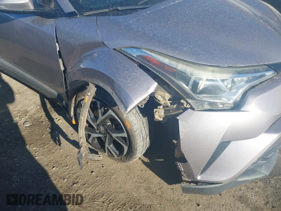 2018 Toyota C-HR XLE with VIN NMTKHMBX3JR048303, listed as a IAAI auction lot 41695246 with 125,081 mi miles. Bid and sale history available at carsss.com. Image 6.