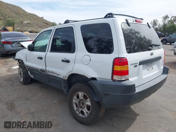 2004 Ford Escape XLT with VIN 1FMYU03134KA80217, listed as a IAAI auction lot 41672764 with 184,601 mi miles. Bid and sale history available at carsss.com. Image 3.