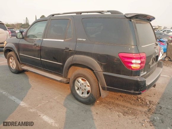 2002 Toyota Sequoia Limited with VIN 5TDZT38A32S065230, listed as a IAAI auction lot 41290794 with 306,444 mi miles. Bid and sale history available at carsss.com. Image 3.