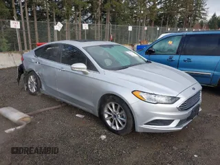 2017 Ford Fusion SE z VIN 3FA6P0HD2HR149699, wystawiony jako IAAI lot #41872383 z przebiegiem 95 587 mil mil oraz . Historia ofert i sprzedaży dostępna na DreamBid. Obrazek 1.