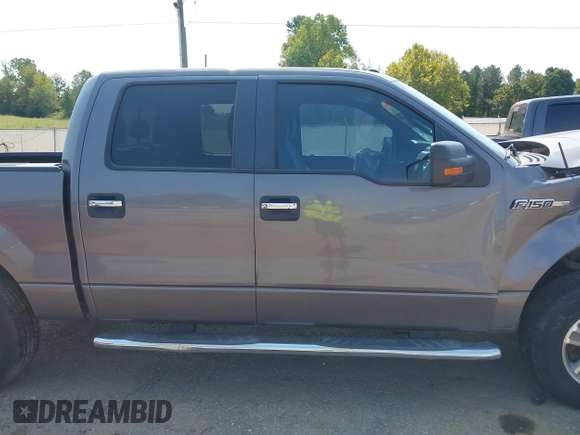 2014 Ford F-150 XL with VIN 1FTFW1CF2EKF75517, listed as a IAAI auction lot 40534480 with 121,035 mi miles. Bid and sale history available at carsss.com. Image 13.