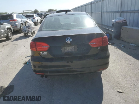 2014 Volkswagen Jetta TDI w/Premium with VIN 3VW3L7AJ2EM392016, listed as a Copart auction lot 69305904 with 111,903 mi miles and Salvage title. Bid and sale history available at DreamBid. Image 6.