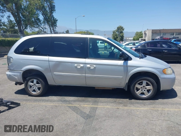 2005 Dodge Caravan SXT с VIN 2D4GP44L25R401250, выставлен на аукционе IAAI как лот 42544407 с пробегом 91 835 миль миль и . История ставок и продаж доступна на DreamBid. Изображение 13.