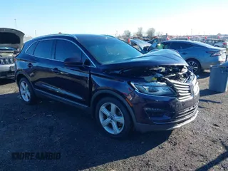 2015 Lincoln MKC with VIN 5LMCJ1A97FUJ18148, listed as a IAAI auction lot 41806694 with 69,677 mi miles. Bid and sale history available at carsss.com. Image 1.