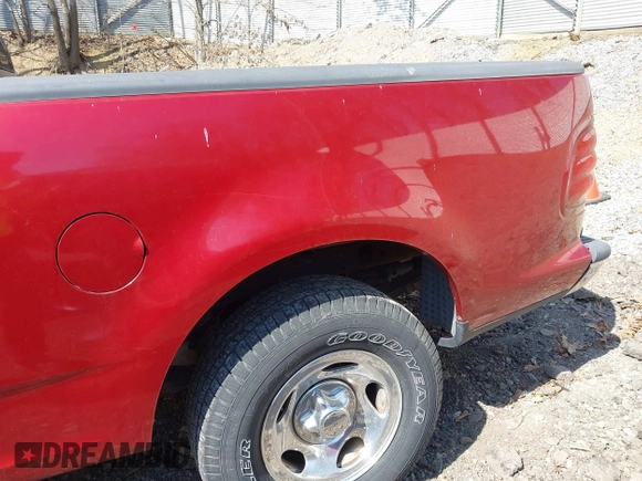 2003 Ford F-150 XLT with VIN 1FTRW07L13KD81923, listed as a IAAI auction lot 42112168 with 147,039 mi miles. Bid and sale history available at carsss.com. Image 12.