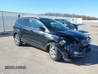 2015 Ford Escape Titanium with VIN 1FMCU0JX7FUA76731, listed as a IAAI auction lot 41684588 with 87,824 mi miles. Bid and sale history available at carsss.com. Image 1.