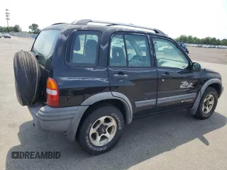 2002 Chevrolet Tracker ZR2 with VIN 2CNBJ734726906603, listed as a Copart auction lot 65281904 with 79,375 mi miles and Clean title. Bid and sale history available at DreamBid. Image 3.