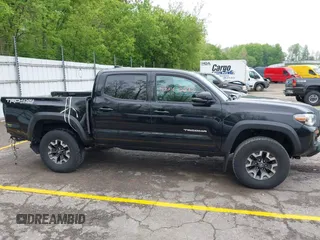 2021 Toyota Tacoma SR with VIN 3TMCZ5AN0MM417261, listed as a IAAI auction lot 42240693 with 38,625 mi miles and . Bid and sale history available at DreamBid. Image 14.