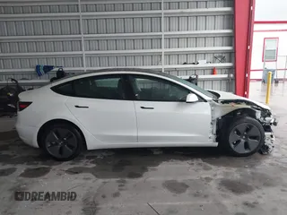 2023 Tesla Model 3 with VIN 5YJ3E1EA9PF548726, listed as a IAAI auction lot 42345157 with 30,647 mi miles and . Bid and sale history available at DreamBid. Image 14.