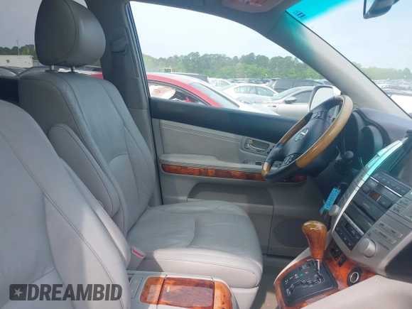 2007 Lexus RX 350 with VIN 2T2GK31U07C023916, listed as a IAAI auction lot 42026162 with 168,099 mi miles. Bid and sale history available at carsss.com. Image 5.
