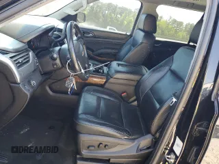 2018 Chevrolet Suburban Premier with VIN 1GNSCJKC1JR199271, listed as a Copart auction lot 52395935 with 216,083 mi miles and Salvage Title. Bid and sale history available at DreamBid. Image 7.