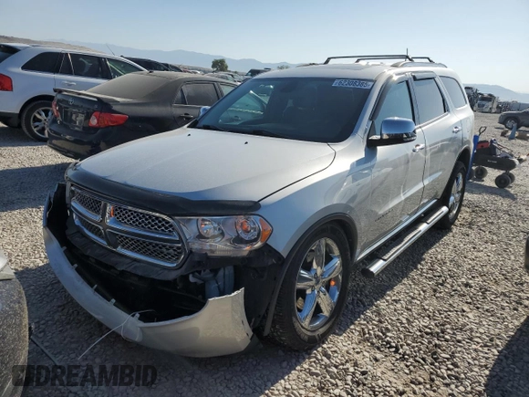 2013 Dodge Durango Citadel with VIN 1C4SDJET2DC602487, listed as a Copart auction lot 62308385 with 124,034 mi miles and Salvage title. Bid and sale history available at DreamBid. Image 1.
