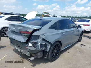 2025 Honda Civic Sport with VIN 2HGFE2F54SH564003, listed as a IAAI auction lot 42123436 with 7,042 mi miles and . Bid and sale history available at DreamBid. Image 4.