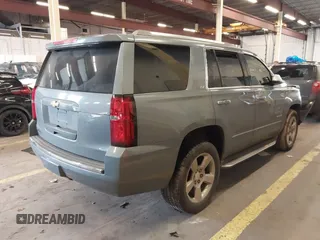 2016 Chevrolet Tahoe LTZ with VIN 1GNSKCKC3GR346276, listed as a IAAI auction lot 41646214 with 102,625 mi miles and . Bid and sale history available at DreamBid. Image 4.