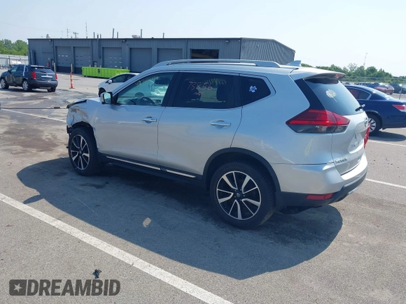 2017 Nissan Rogue SV with VIN 5N1AT2MV0HC832876, listed as a IAAI auction lot 42389131 with 73,856 mi miles and . Bid and sale history available at DreamBid. Image 3.