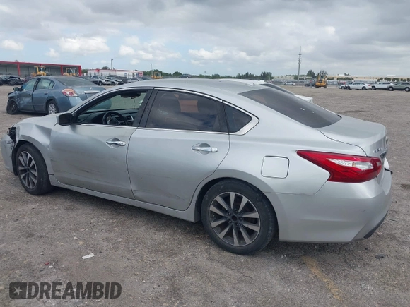 2017 Nissan Altima SV with VIN 1N4AL3AP7HC188945, listed as a IAAI auction lot 42111225 with 157,185 mi miles and . Bid and sale history available at carsss.com. Image 3.