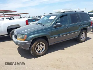 2001 Jeep Grand Cherokee Laredo with VIN 1J4GW48N51C612600, listed as a IAAI auction lot 42348631 with 165,918 mi miles and . Bid and sale history available at DreamBid. Image 2.