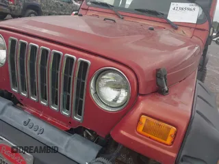 2000 Jeep Wrangler Sport with VIN 1J4FA49S2YP764321, listed as a IAAI auction lot 42385965 with Not provided miles and . Bid and sale history available at DreamBid. Image 10.