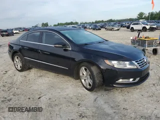 2014 Volkswagen CC Sport z VIN WVWBN7AN5EE517740, wystawiony jako Copart lot #55872735 z przebiegiem 191 650 mil mil oraz Szkoda całkowita • Salvage title. Historia ofert i sprzedaży dostępna na DreamBid. Obrazek 4.