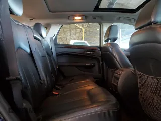 2012 Cadillac SRX Premium Collection z VIN 3GYFNFE30CS599863, wystawiony jako Copart lot #61249995 z przebiegiem 144 740 mil mil oraz Czysty tytuł • Clean title. Historia ofert i sprzedaży dostępna na DreamBid. Obrazek 10.