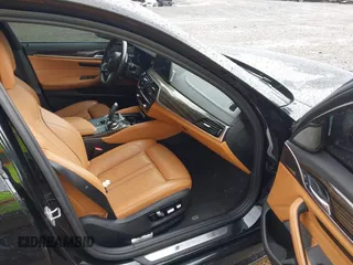 2018 BMW 5 Series M550i xDrive with VIN WBAJB9C5XJB286923, listed as a IAAI auction lot 42527301 with 76,923 mi miles and . Bid and sale history available at DreamBid. Image 5.