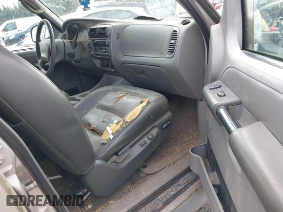 2003 Ford Explorer Sport Trac XLS z VIN 1FMZU77E93UA38468, wystawiony jako IAAI lot #41667956 z przebiegiem 291 806 mil mil oraz . Historia ofert i sprzedaży dostępna na DreamBid. Obrazek 5.