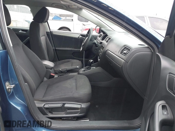 2015 Volkswagen Jetta Sedan 1.8T SE with VIN 3VWD17AJ5FM310694, listed as a IAAI auction lot 41735569 with 147,232 mi miles. Bid and sale history available at carsss.com. Image 5.
