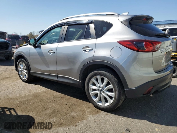 2014 Mazda CX-5 Grand Touring with VIN JM3KE4DY4E0305212, listed as a Copart auction lot 53145305 with 233,061 mi miles and Salvage Title. Bid and sale history available at carsss.com. Image 2.