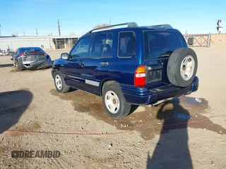 2003 Suzuki Vitara z VIN 2S3TE52V436101091, wystawiony jako IAAI lot #41472279 z przebiegiem 163 429 mil mil oraz . Historia ofert i sprzedaży dostępna na DreamBid. Obrazek 3.