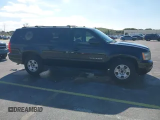 2011 Chevrolet Suburban LS with VIN 1GNSCHE04BR284777, listed as a IAAI auction lot 41291991 with 285,187 mi miles. Bid and sale history available at carsss.com. Image 13.