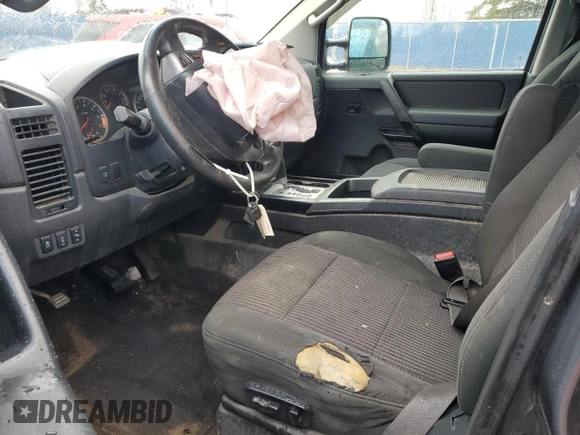 2014 Nissan Titan S with VIN 1N6AA0ECXEN515423, listed as a Copart auction lot 47934505 with 208,900 mi miles and Salvage Title. Bid and sale history available at DreamBid. Image 7.