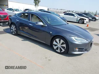 2020 Tesla Model S Long Range z VIN 5YJSA1E24LF415849, wystawiony jako IAAI lot #42571945 z przebiegiem 34 398 mil mil oraz . Historia ofert i sprzedaży dostępna na DreamBid. Obrazek 1.