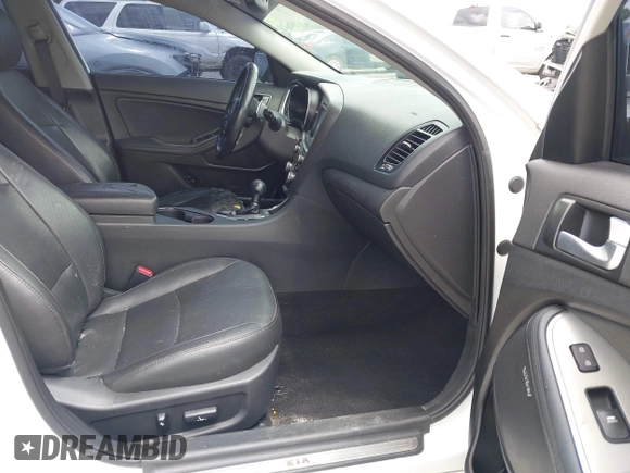 2015 Kia Optima SX with VIN 5XXGR4A77FG444488, listed as a IAAI auction lot 42284483 with 119,359 mi miles and . Bid and sale history available at DreamBid. Image 5.