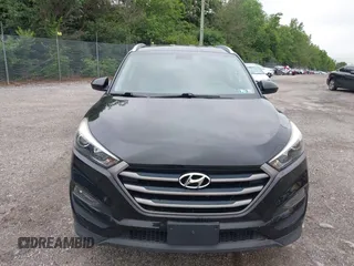 2016 Hyundai Tucson SE z VIN KM8J3CA45GU041303, wystawiony jako IAAI lot #42463591 z przebiegiem 96 516 mil mil oraz . Historia ofert i sprzedaży dostępna na DreamBid. Obrazek 13.