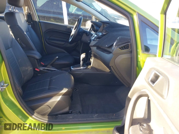 2018 Ford Fiesta Titanium z VIN 3FADP4FJ2JM142861, wystawiony jako IAAI lot #41860660 z przebiegiem 20 820 mil mil oraz . Historia ofert i sprzedaży dostępna na DreamBid. Obrazek 5.