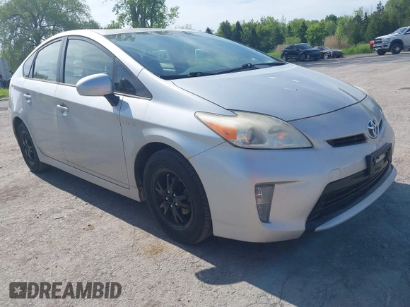 2012 Toyota Prius One z VIN JTDKN3DU1C5489783, wystawiony jako IAAI lot #42376357 z przebiegiem 246 966 mil mil oraz . Historia ofert i sprzedaży dostępna na DreamBid. Obrazek 1.
