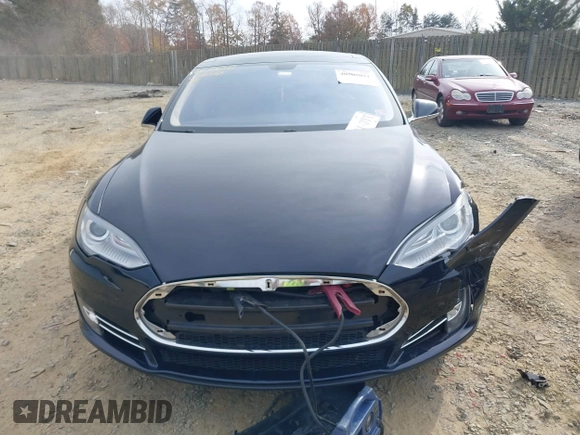 2014 Tesla Model S 60 with VIN 5YJSA1S12EFP42605, listed as a IAAI auction lot 40905031 with 68,155 mi miles and . Bid and sale history available at DreamBid. Image 12.