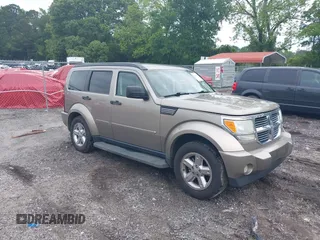2007 Dodge Nitro SLT z VIN 1D8GT58K07W735904, wystawiony jako IAAI lot #42216665 z przebiegiem 168 000 mil mil oraz . Historia ofert i sprzedaży dostępna na DreamBid. Obrazek 1.