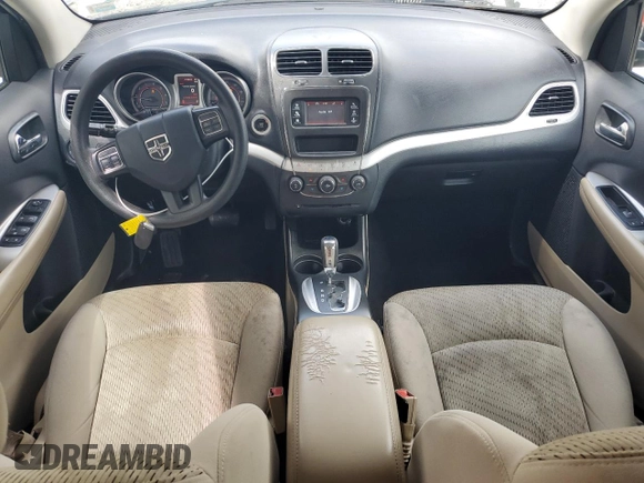 2014 Dodge Journey American Value with VIN 3C4PDCAB3ET216889, listed as a Copart auction lot 60874265 with 117,508 mi miles and Salvage title. Bid and sale history available at DreamBid. Image 8.