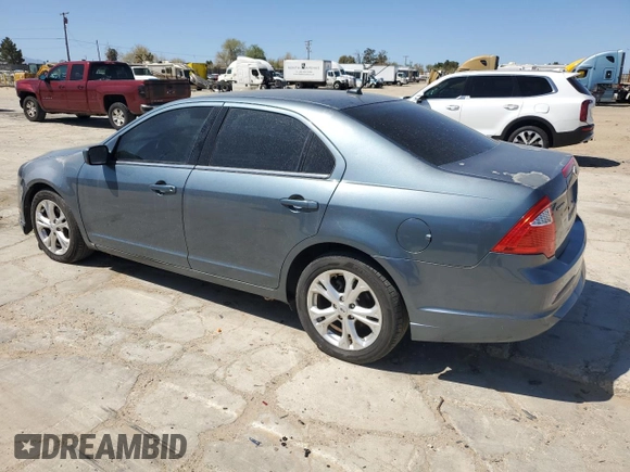 2012 Ford Fusion SE z VIN 3FAHP0HA0CR213729, wystawiony jako Copart lot #52458665 z przebiegiem 107 419 mil mil oraz Czysty tytuł • Clean title. Historia ofert i sprzedaży dostępna na DreamBid. Obrazek 2.