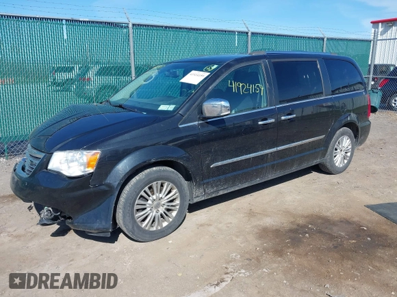 2015 Chrysler Town & Country Limited Platinum with VIN 2C4RC1GG2FR529357, listed as a IAAI auction lot 41924159 with 220,575 mi miles and . Bid and sale history available at DreamBid. Image 2.