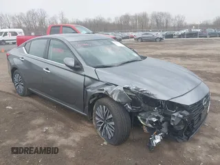 2023 Nissan Altima SV z VIN 1N4BL4DW0PN302056, wystawiony jako IAAI lot #42106411 z przebiegiem 20 942 mil mil oraz . Historia ofert i sprzedaży dostępna na DreamBid. Obrazek 1.