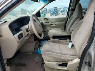 2003 Ford Windstar LX z VIN 2FMZA51423BA92083, wystawiony jako Copart lot #75399354 z przebiegiem Nie podano mil oraz Szkoda całkowita • Salvage title. Historia ofert i sprzedaży dostępna na DreamBid. Obrazek 7.