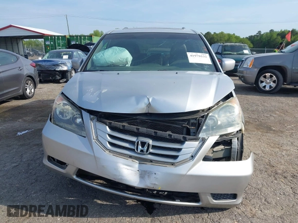 2010 Honda Odyssey EX-L with VIN 5FNRL3H78AB034756, listed as a IAAI auction lot 41979532 with 167,791 mi miles and . Bid and sale history available at DreamBid. Image 12.