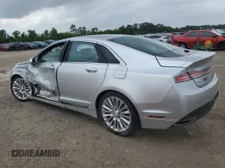 2016 Lincoln MKZ z VIN 3LN6L2GK3GR623560, wystawiony jako Copart lot #55337905 z przebiegiem 167 403 mil mil oraz Szkoda całkowita • Salvage title. Historia ofert i sprzedaży dostępna na DreamBid. Obrazek 2.